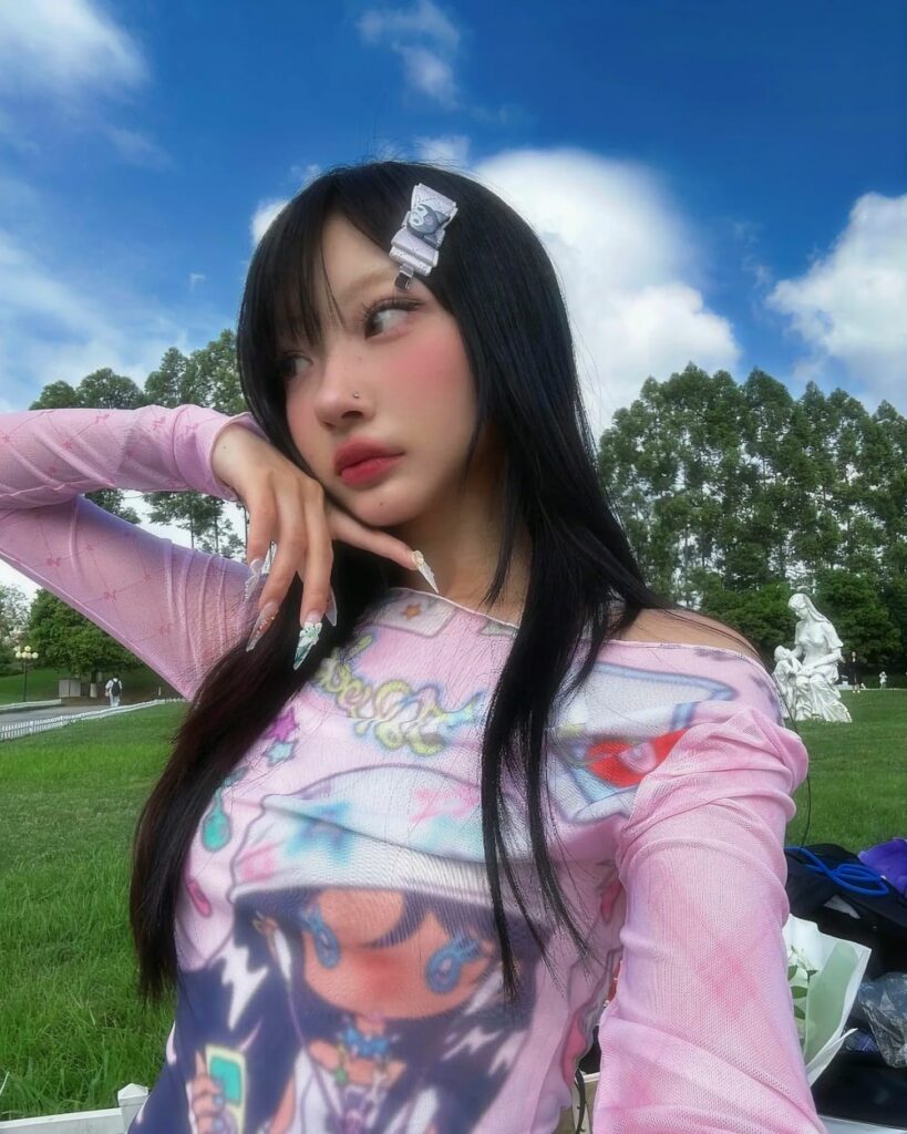 Retro pink cutecore top with a colorful graphic print, long sleeves.