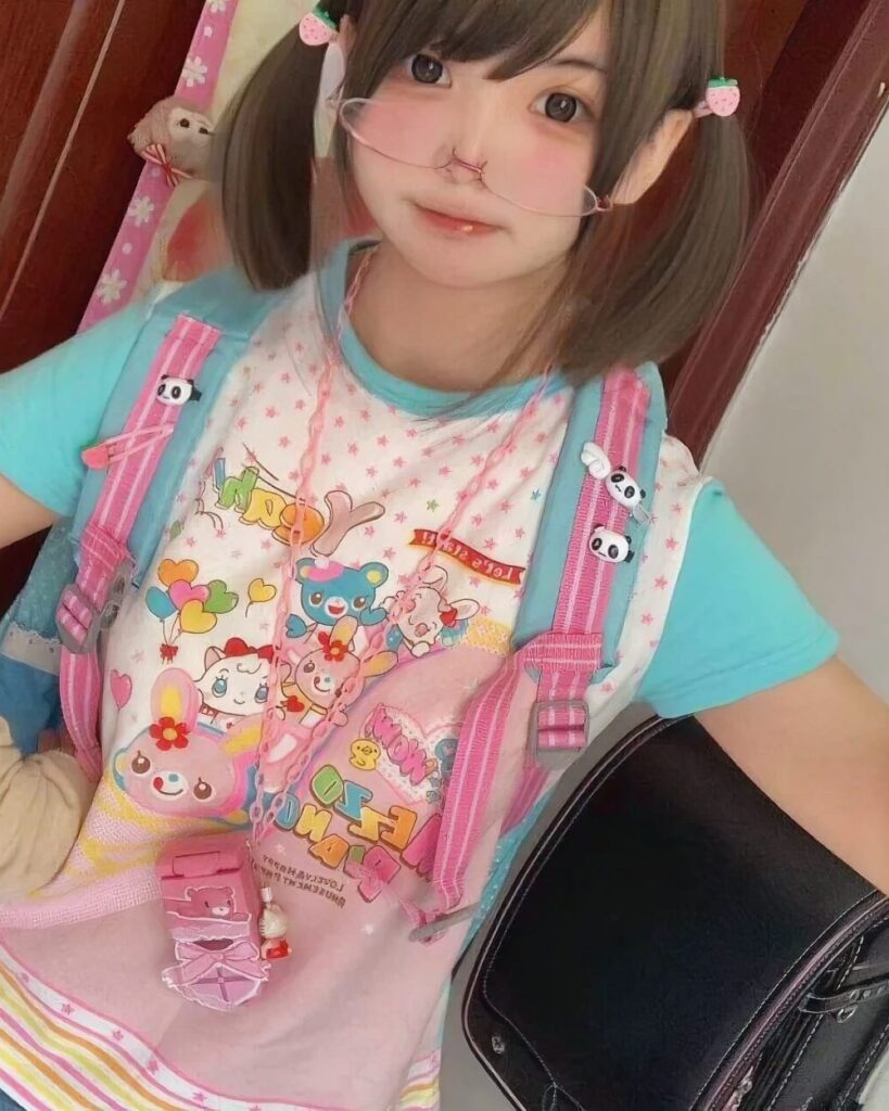 Woman wearing a Kawaii Pastel Mezzo Piano T-Shirt - Yume Kawaii Aesthetic with a layered outfit.