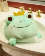 Kero the Queen and King Frog Plushie, a cute teal frog prince plushie in a sink.