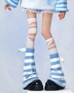 Blue and white striped gyaru socks, styled with bandages, Harajuku aesthetic.
