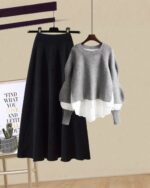 Gray and black korean aesthetic set, featuring a sweater and skirt, displayed on a hanger.