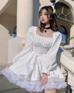 White french aesthetic dress with lace details and puff sleeves.