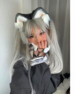 Close-up of a person wearing Winged Love Bracelets and a cat ear wig, showcasing the jewelry.