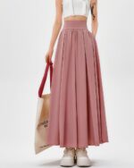 Long loose summer skirt in a korean aesthetic, flowing design, pink color.