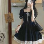 Black puffy dress with lace details, a dark kawaii dress.