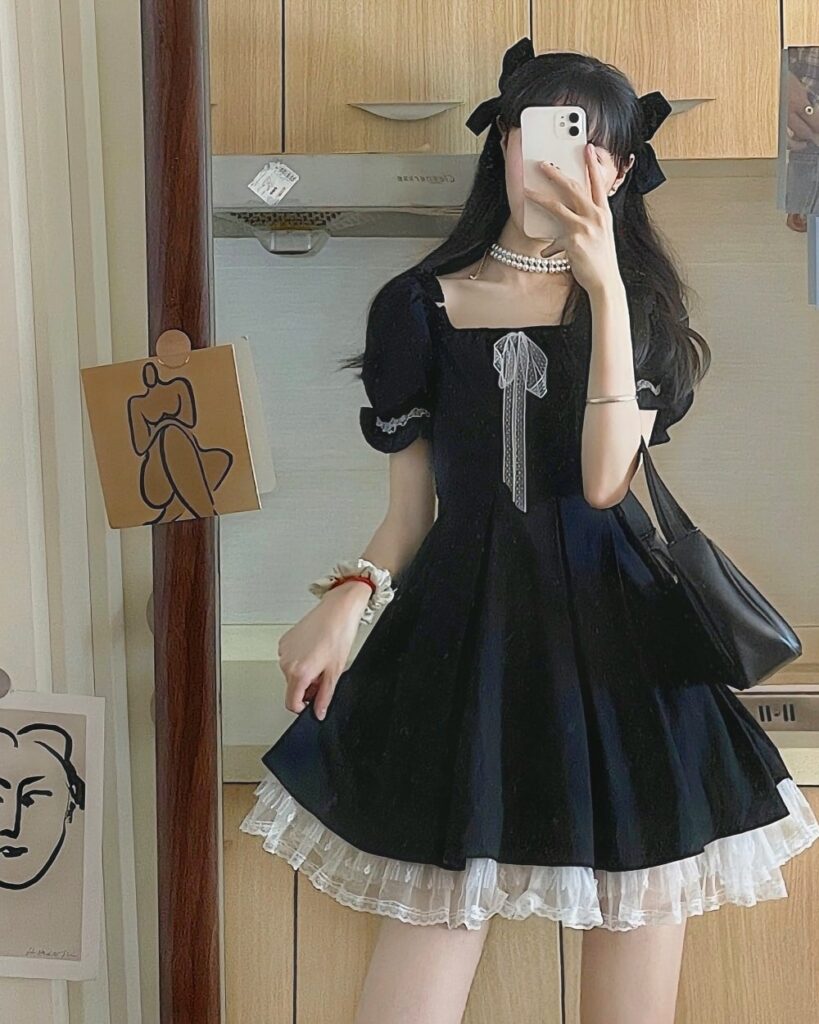 Black puffy dress with lace details, a dark kawaii dress.