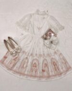 White gothic lolita dress with lace details and a delicate design.