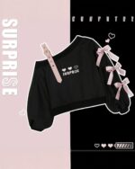 Black lolita aesthetic sweater with off-shoulder design and heart embroidery.