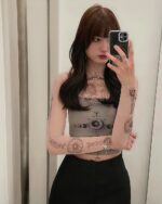 Mesh pattern witchcore long sleeve top featuring celestial designs.