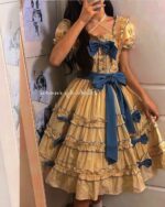 Yellow ruffled french lolita dress with blue ribbon trim and sleeves.