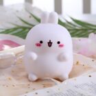 Kawaii Molang bunny lamp, a cute silicone night light with pink details and white fur.