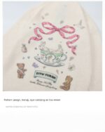Kawaii rabbit sweater featuring a vintage pattern with rabbits, teacups, and bears.