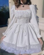 White french aesthetic dress with lace details and puff sleeves.