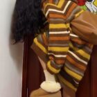 Long Retro Style Dress - Vintage Aesthetic featuring a striped knit design and shearling boots.