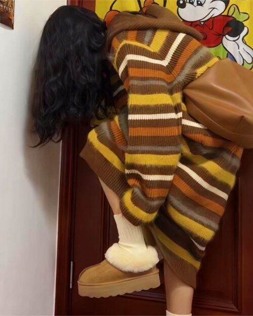 Long Retro Style Dress - Vintage Aesthetic featuring a striped knit design and shearling boots.