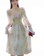 Pale green french floral dress with long sleeves and floral print. Retro aesthetic style.