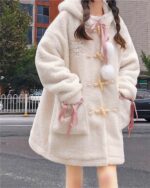 Fluffy hooded coat featuring a teddy bear design, bunny pom, and ribbon details.