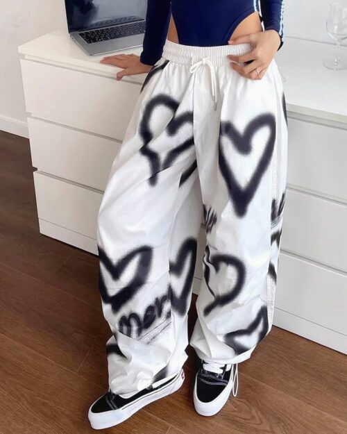 High Waist Loose Pants - Y2K aesthetic pants with large white graffiti print.