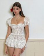 White coquette mesh dress with puffed sleeves and a layered skirt. Floral princess dress style.