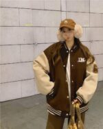 Brown and beige korean aesthetic jacket with cream sleeves and varsity details.
