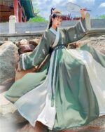 Jade Ruqun Hanfu Long Dress worn outdoors, featuring a flowing, layered design.