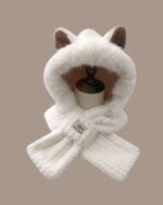 Fluffy fox ear beanie, a white faux fur hooded neck warmer.