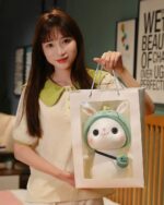 Cotton the Adventurous Rabbit kawaii bunny plushie in a gift bag, adorable aesthetic toy.
