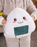 Kawaii onigiri plushie, a cute rice ball shaped plush toy.