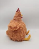 A plush fat chicken toy, featuring orange fur and a red comb. It's a fat chicken plushie.
