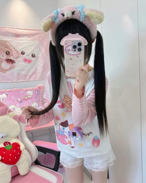 Pink kawaii striped shirt with cute character prints. Long sleeve Yume Kawaii top.