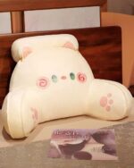 Close-up of a kawaii cat plushie, soft and plush with paw prints and eyes. kawaii cat plushie.
