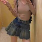 Retro pleat mini skirt, y2k aesthetic denim skirt with ruffles and frayed hem.