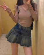 Retro pleat mini skirt, y2k aesthetic denim skirt with ruffles and frayed hem.