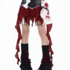 Black punk plaid denim skirt with layered ruffles and accessories, Y2K style.