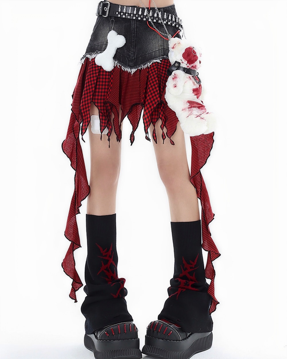 Black punk plaid denim skirt with layered ruffles and accessories, Y2K style.