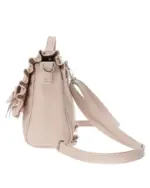 Side view of a vegan leather jirai kei bag with ruffles and straps.