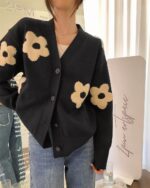 Black floral Korean cardigan featuring a shawl collar and button closure.