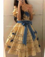 Yellow French lolita dress with lace details, ruffled skirt, and blue bow.