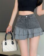 Gray ruffled denim y2k aesthetic skirt, high-waisted, with a crop top.