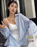 Long-sleeved striped casual shirt, Korean aesthetic shirt, showcasing a relaxed style.