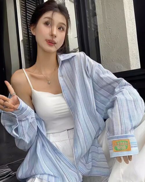 Long-sleeved striped casual shirt, Korean aesthetic shirt, showcasing a relaxed style.