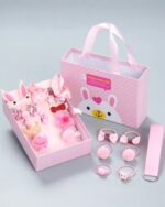 Kawaii DIY material gift bag contents, including hair accessories and decorative items, displayed in a pink gift box.