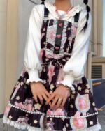 Close-up of an Angel Kawaii Dress - Lolita Aesthetic, featuring a floral and star pattern, with shoulder straps and puffed sleeves.