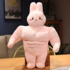 Pink buff bunny plushie with a muscular build and cute face.