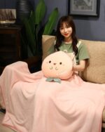 Kawaii fruit plushie cushion featuring a pink melon design, soft and plush.