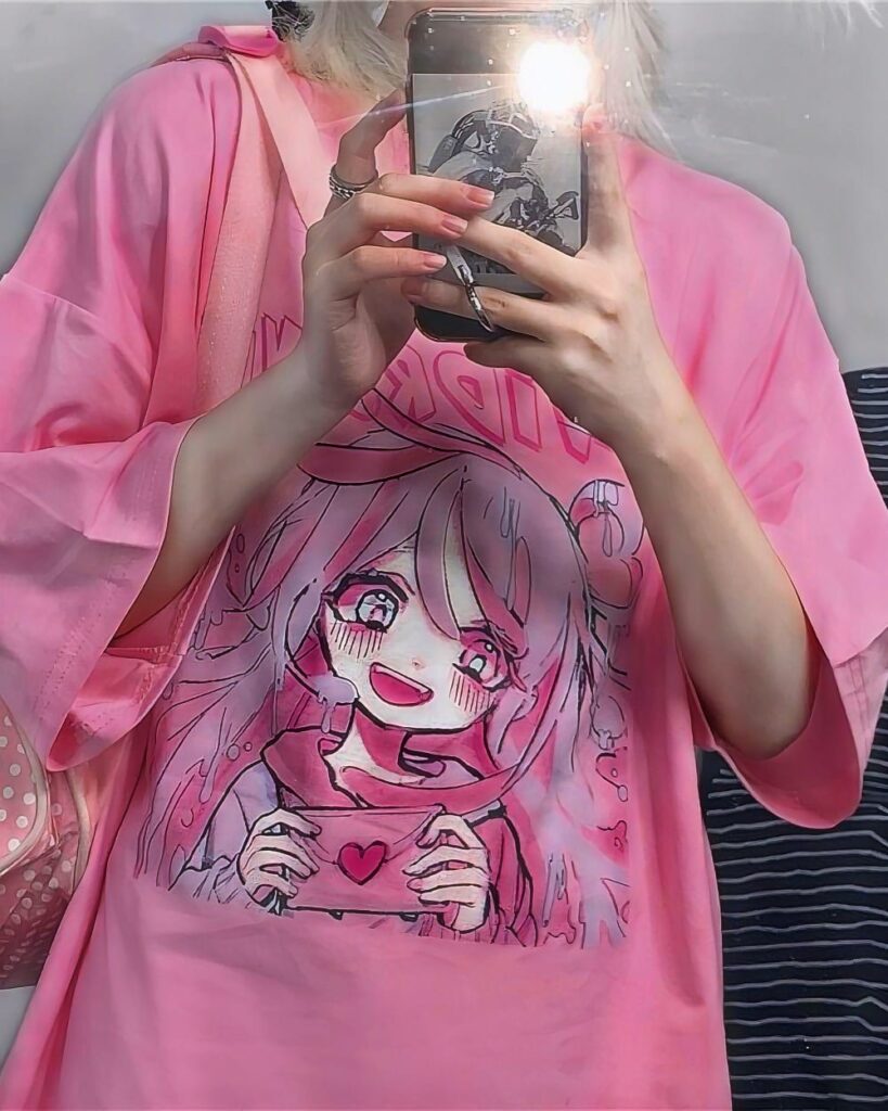 Pink unidrone oversized t-shirt featuring an anime illustration.