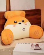Kawaii cat plushie, a soft orange cushion with embroidered details and paws.