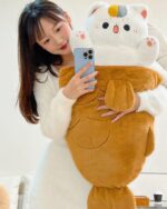 Kawaii Big Taiyaki Plushie - Cute Animals Edition, a stuffed taiyaki plushie being held by a person.