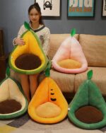 Three kawaii fruit cushions – peach, orange, and green – displayed as seat cushions.