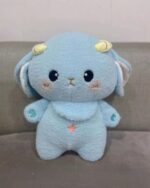 Blue kawaii space sheep plushie with star details.